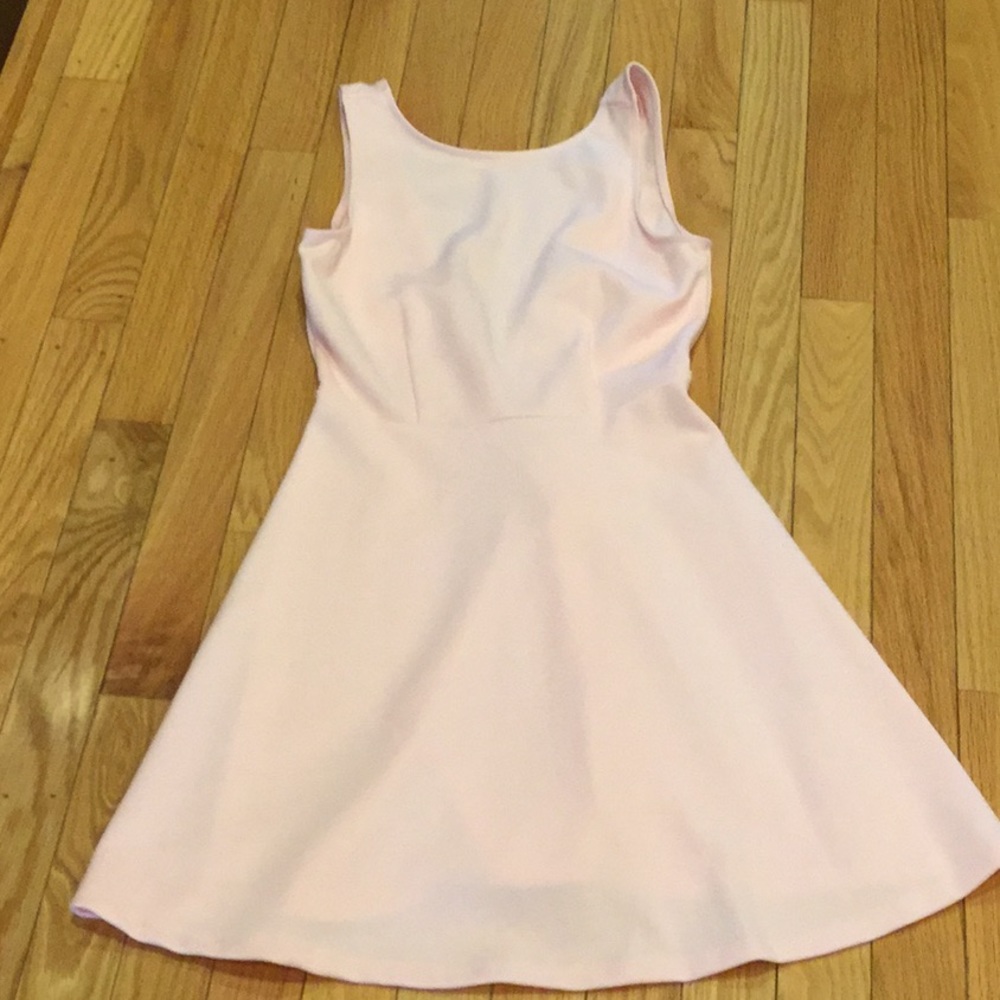 Forever 21 pastel colored  pink fit and flare mini dress with V back.